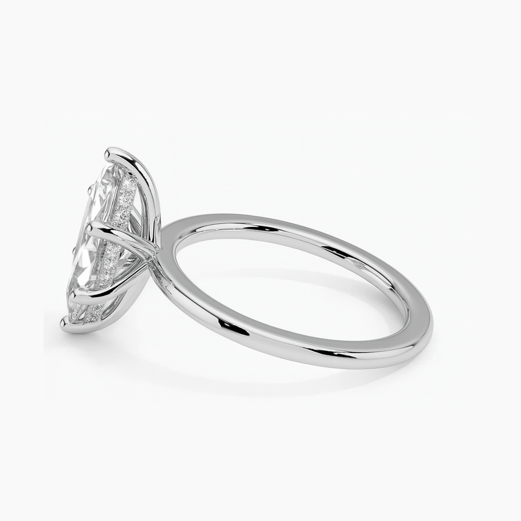THEIA | Anillo solitario marquesa halo oculto