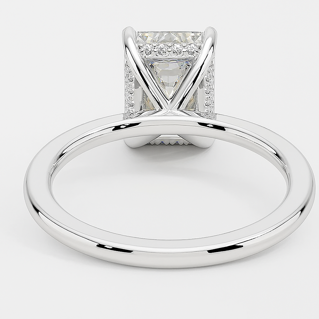 THEIA | Anillo solitario esmeralda halo oculto